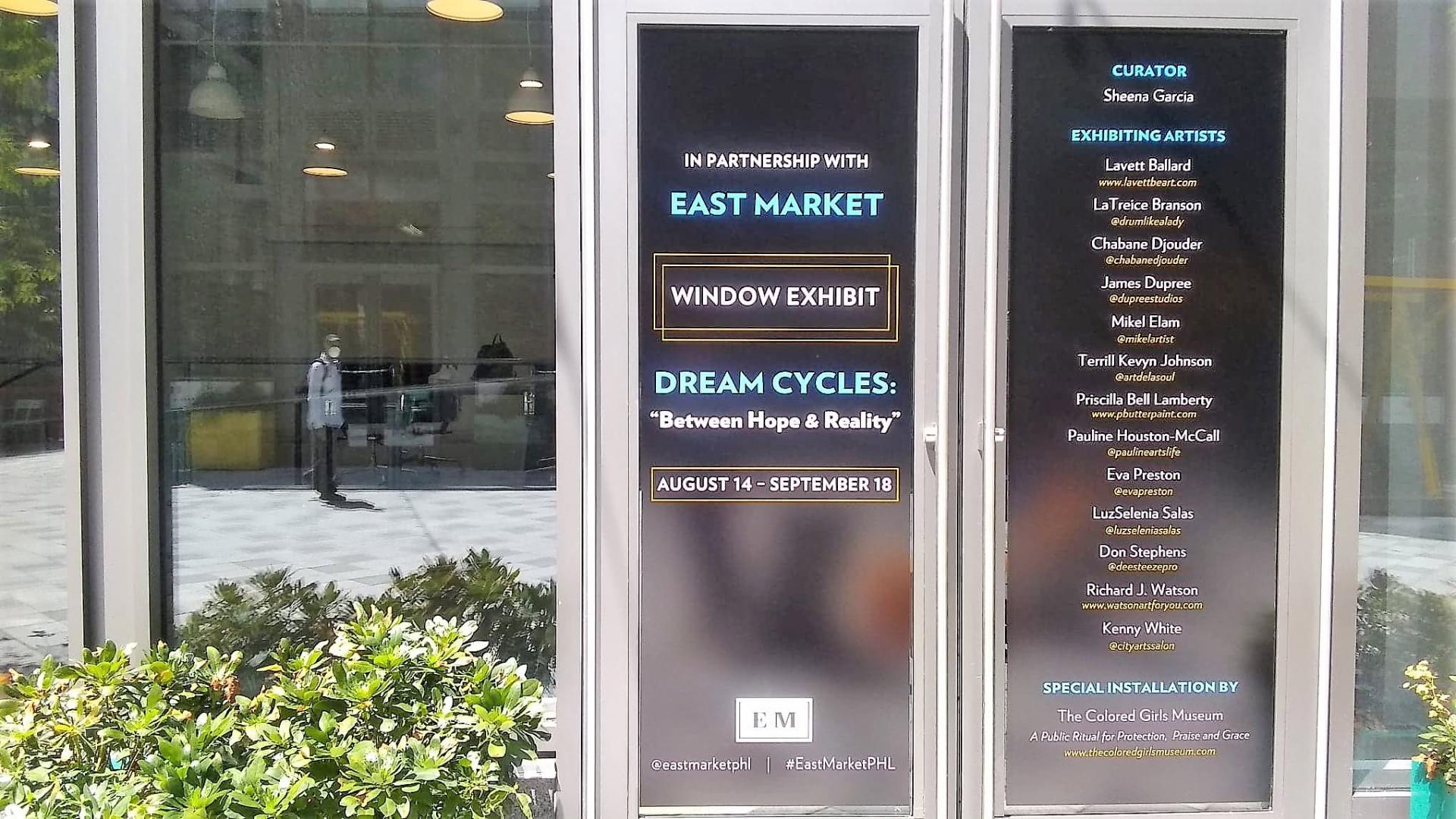 Window exhibit installation of Dream Cycles: Between Hope & Reality at East Market Chestnut Walk, curated by Sheena Garcia