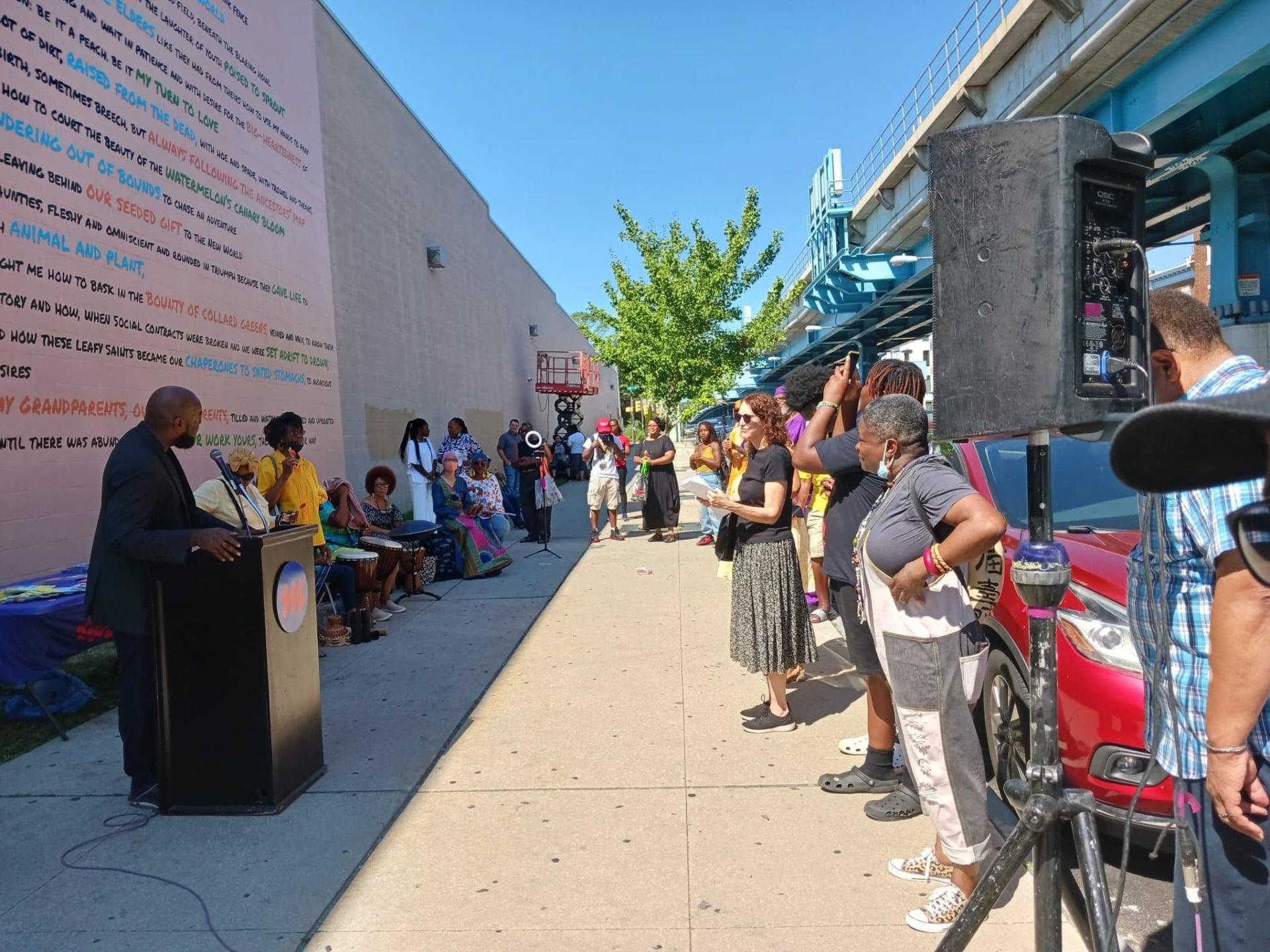 Community gathered at the Sowing Desire mural reveal celebration in West Philadelphia