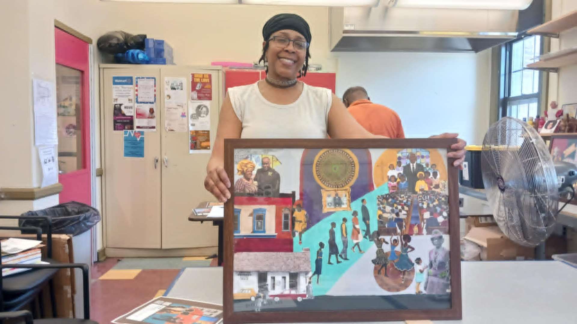 Community Artist with Completed Work