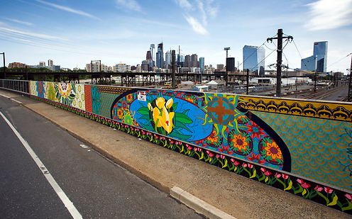 Completed Spring Garden Bridge mural with Philadelphia skyline in the background